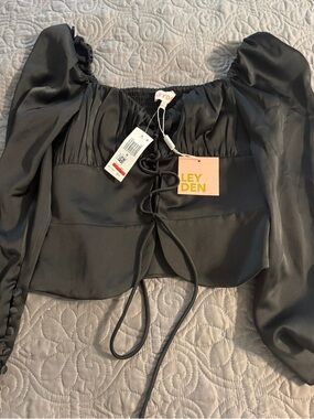 Leyden Black Puff Sleeve Lace-Up Long sleeve top. NWT. Size M